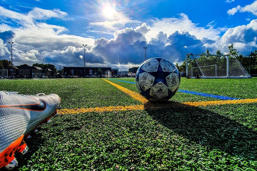 Playing football in the sun