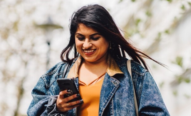 Student looking at phone