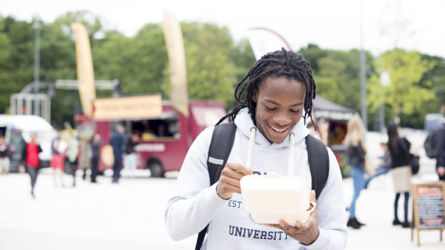 Students eating at one of our local food vendors